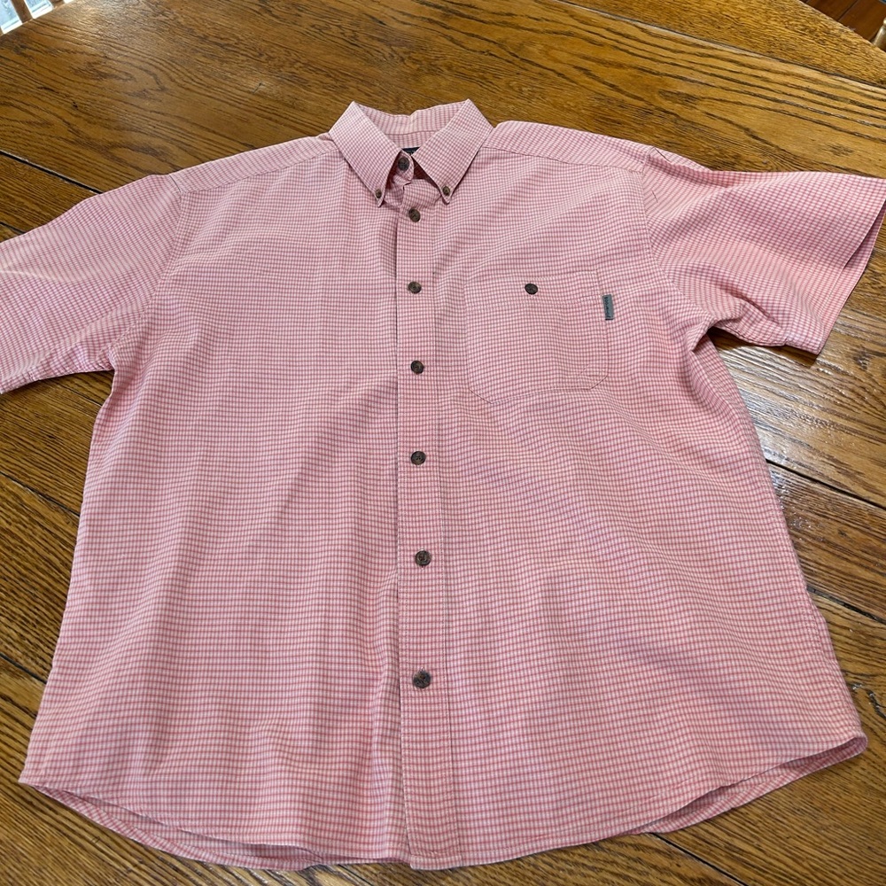 Woolrich red checked short sleeve button front shirt.  Front pocket. Size Large